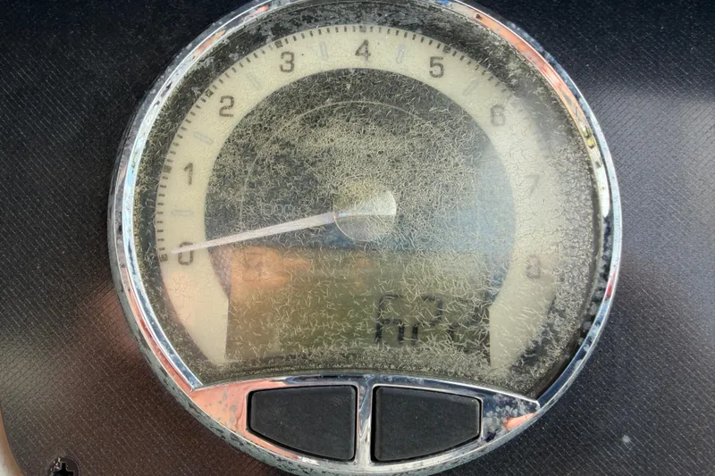 Slide: The Image of Close-up of a weathered speedometer on a 2021 Barletta C20UC boat. - 11