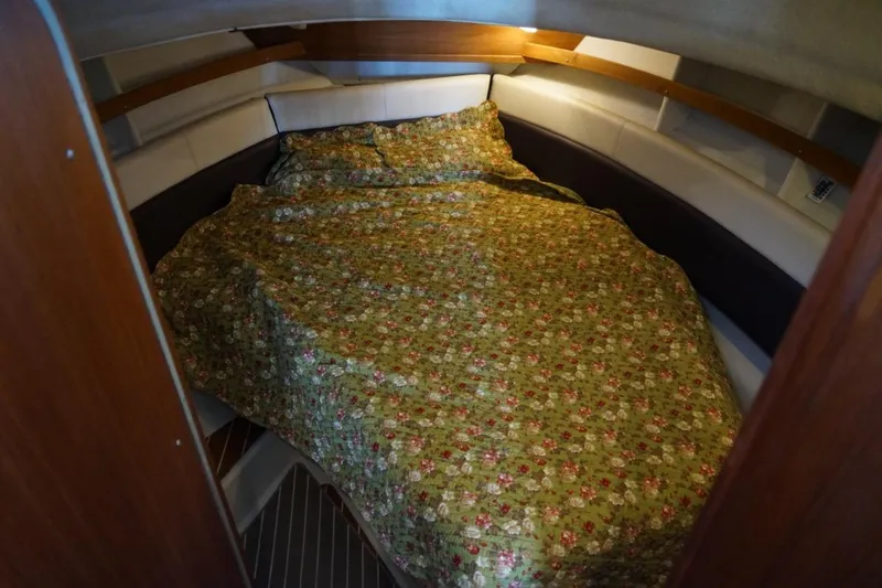 Slide: The Image of Cozy cabin interior of 2014 Ranger Tugs R-31 with floral bedding. - 42