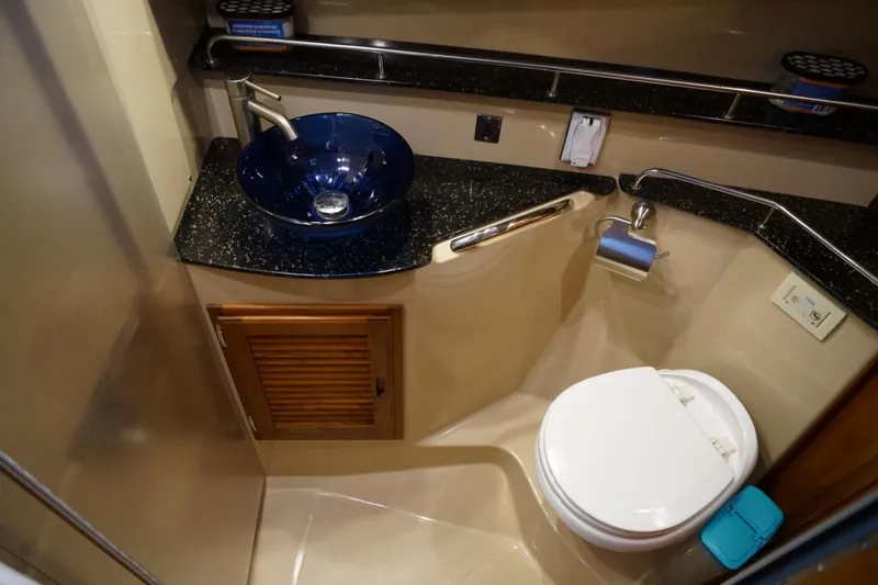 Slide: The Image of Luxurious 2014 Ranger Tugs R-31 bathroom with modern sink and toilet. - 44