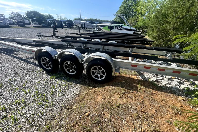 Slide: The Image of Triple-axle boat trailer on gravel, suitable for 2014 Ranger Tugs R-31 S. - 47