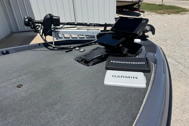 Slide: The Image of 2020 Skeeter FXR21 Apex boat with Garmin and Humminbird electronics on deck. - 4