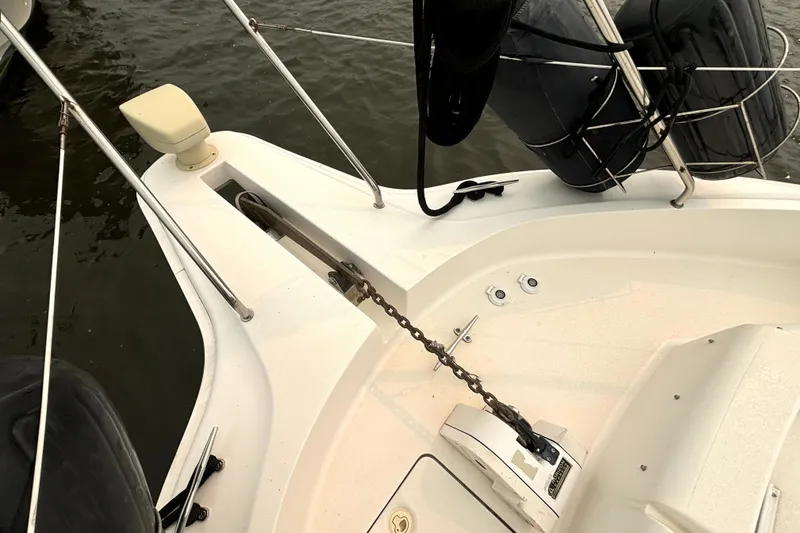 Slide: The Image of Bow of 2000 Silverton 422 Motor Yacht with anchor chain and railing. - 14