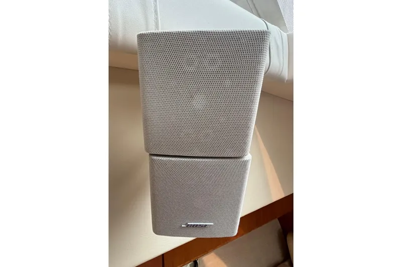 Slide: The Image of White Bose speaker on a 2000 Silverton 422 Motor Yacht interior. - 48