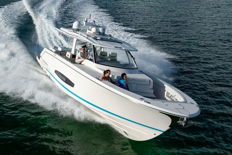 The Image of Manufacturer Provided Image: 2026 Regal 43 SAV luxury boat cruising on open water. - 0