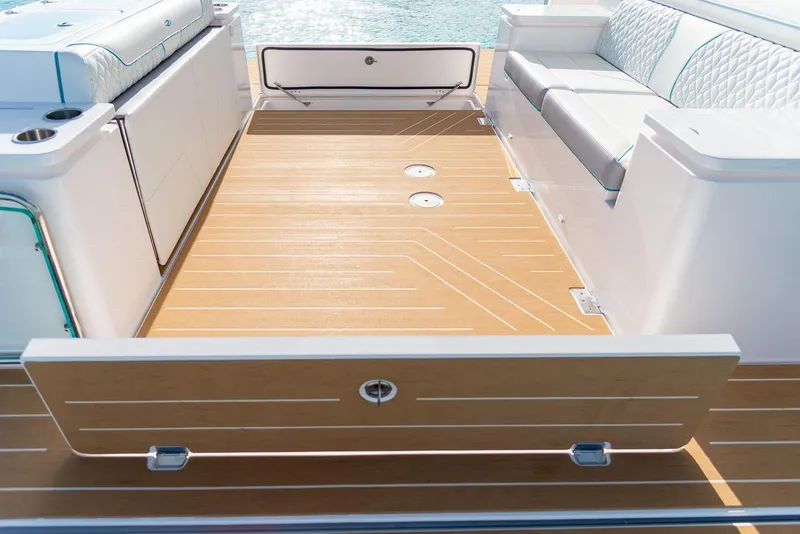 Slide: The Image of Manufacturer Provided Image: 2026 Regal 43 SAV boat deck with luxurious seating and sleek design. - 10