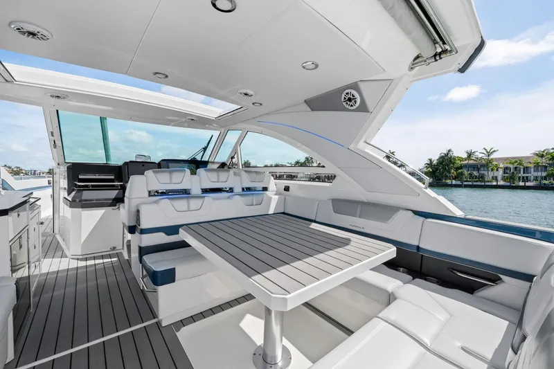 Slide: The Image of 2025 Formula 400 Super Sport Crossover yacht interior with sleek seating and modern design. - 23