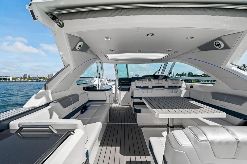 Slide: The Image of 2025 Formula 400 Super Sport Crossover luxury yacht interior with spacious seating and sleek design. - 24