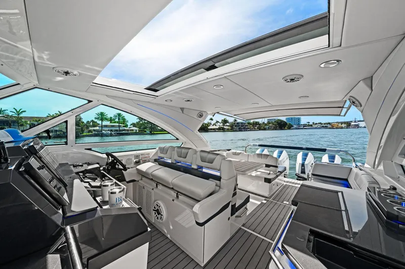 Slide: The Image of 2025 Formula 400 Super Sport Crossover luxury yacht interior with sleek design and waterfront view. - 29