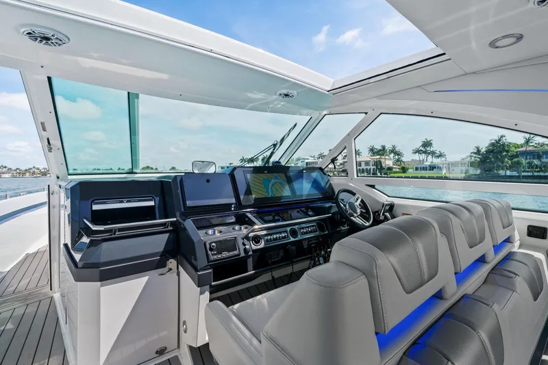 Slide: The Image of 2025 Formula 400 Super Sport Crossover yacht cockpit with modern controls and luxurious seating. - 31