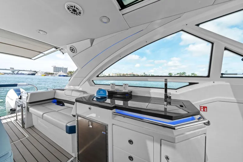 Slide: The Image of 2025 Formula 400 Super Sport Crossover yacht interior with sleek seating and modern amenities. - 33