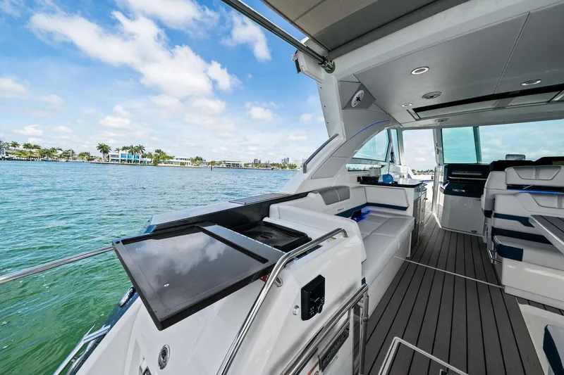 Slide: The Image of Luxurious interior of 2025 Formula 400 Super Sport Crossover yacht with scenic water view. - 34