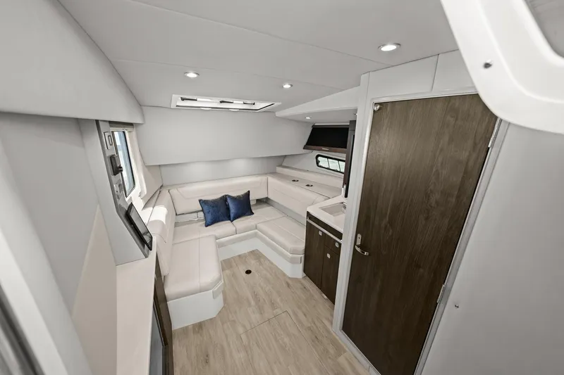 Slide: The Image of Interior of 2025 Formula 400 Super Sport Crossover, featuring modern seating and sleek design. - 35
