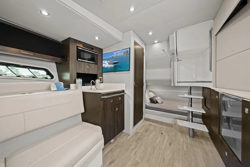Slide: The Image of Luxurious interior of 2025 Formula 400 Super Sport Crossover yacht with modern amenities. - 40