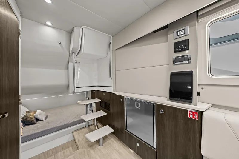 Slide: The Image of Interior of 2025 Formula 400 Super Sport Crossover, featuring modern cabin design and amenities. - 41