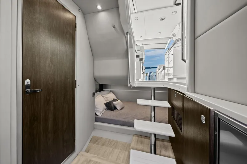 Slide: The Image of Interior of 2025 Formula 400 Super Sport Crossover yacht, featuring modern cabin and sleek design. - 42