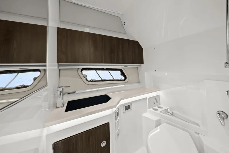 Slide: The Image of Luxurious bathroom interior of 2025 Formula 400 Super Sport Crossover yacht, featuring sleek design. - 45