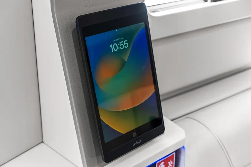 Slide: The Image of Tablet mounted on 2025 Formula 400 Super Sport Crossover, displaying colorful screen interface. - 46