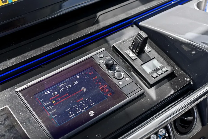 Slide: The Image of Control panel of 2025 Formula 400 Super Sport Crossover boat, featuring advanced navigation display. - 49