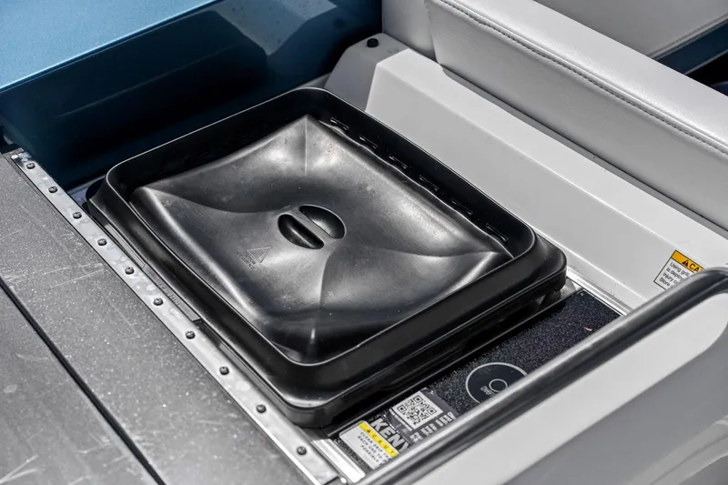 Slide: The Image of 2025 Formula 400 Super Sport Crossover interior detail with black storage compartment. - 53