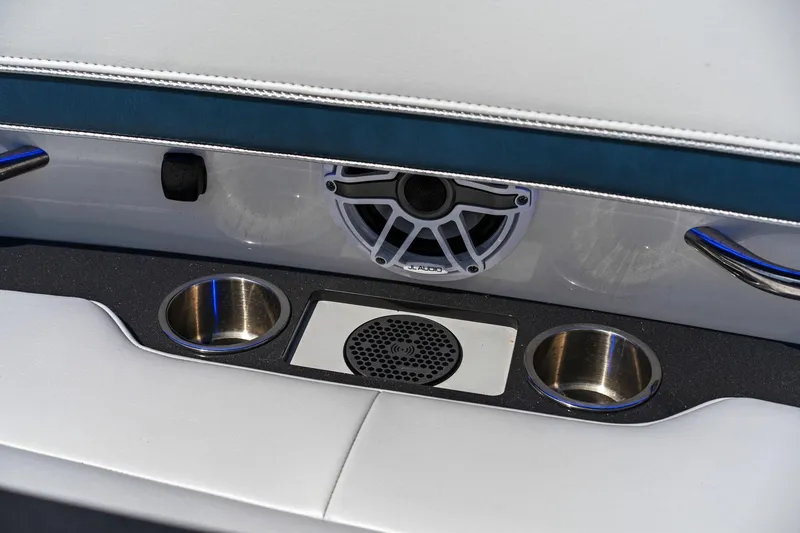 Slide: The Image of Interior of 2025 Formula 400 Super Sport Crossover with cup holders and speaker system. - 55