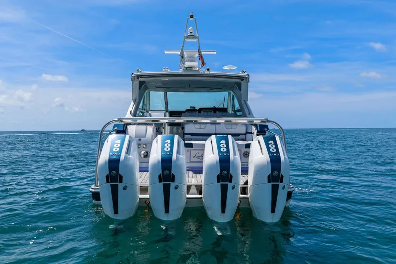 Slide: The Image of 2025 Formula 400 Super Sport Crossover with quad 400 V10 engines on open water. - 61