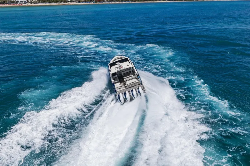 Slide: The Image of 2025 Formula 400 Super Sport Crossover speeding on open blue ocean waters. - 73