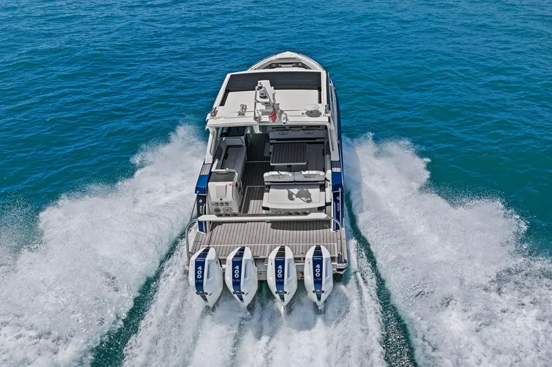 Slide: The Image of 2025 Formula 400 Super Sport Crossover cruising on open water with powerful engines. - 78