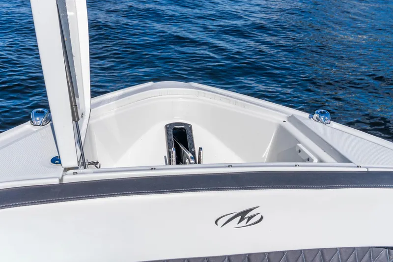 Slide: The Image of 2022 Monterey 378SS Super Sport boat bow with anchor, on calm blue water. - 10