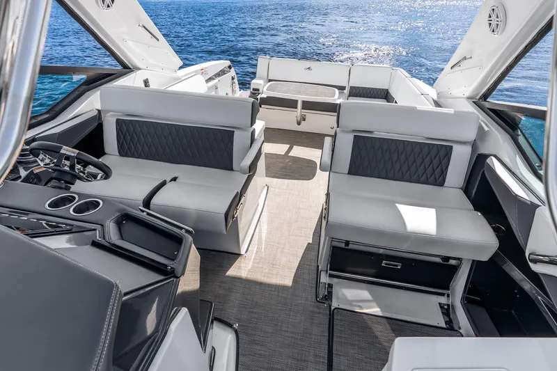 Slide: The Image of Luxurious interior of 2022 Monterey 378SS Super Sport boat with elegant seating and ocean view. - 19