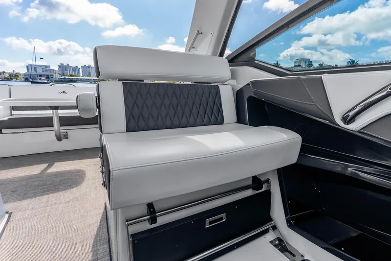 Slide: The Image of 2022 Monterey 378SS Super Sport boat interior with luxurious seating and modern design. - 24