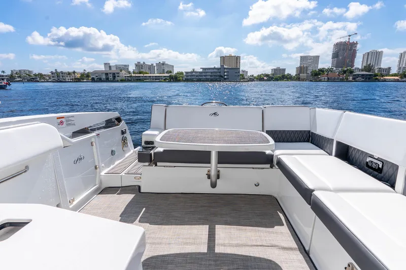 Slide: The Image of 2022 Monterey 378SS Super Sport boat interior with waterfront cityscape view. - 25