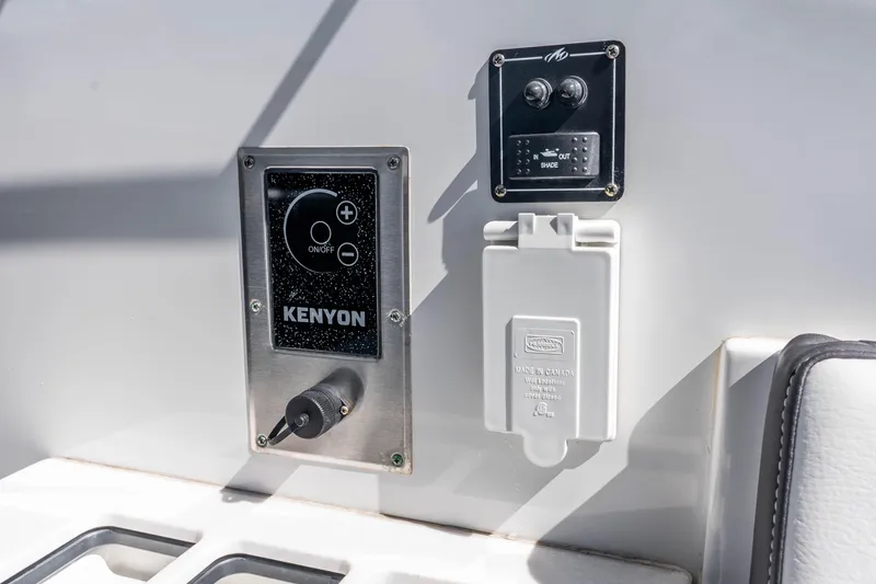 Slide: The Image of Control panel on 2022 Monterey 378SS Super Sport boat, featuring Kenyon system and shade switch. - 28
