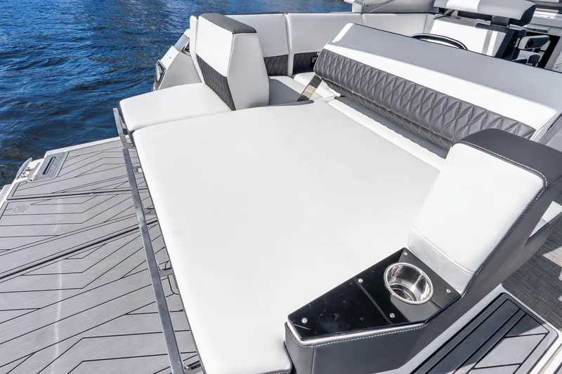 Slide: The Image of 2022 Monterey 378SS Super Sport boat with luxurious seating and sleek design. - 29