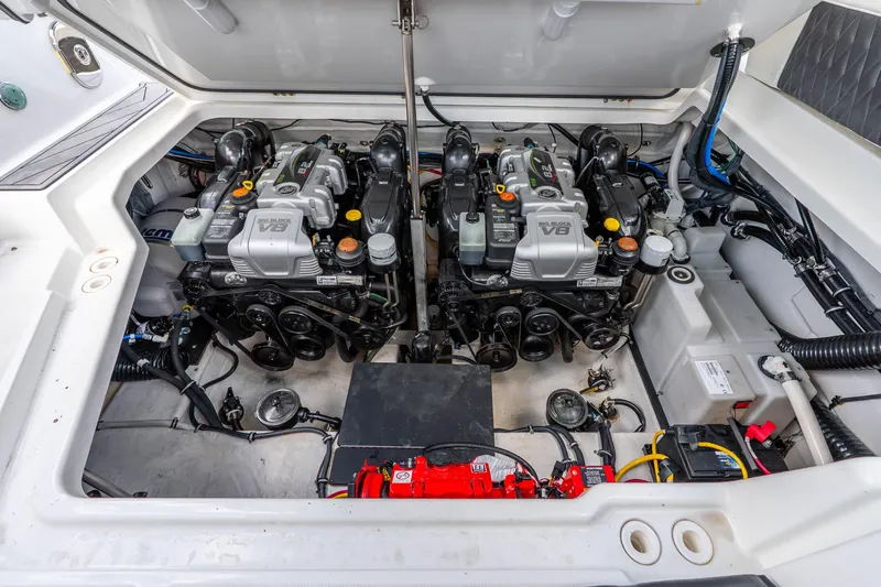 Slide: The Image of Engine compartment of a 2022 Monterey 378SS Super Sport boat, featuring dual V8 engines. - 32