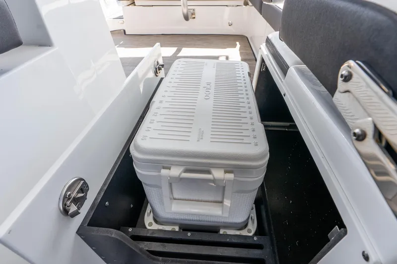 Slide: The Image of Storage compartment with cooler on 2022 Monterey 378SS Super Sport boat. - 33