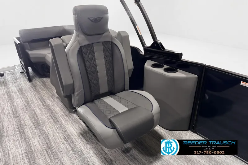 Slide: The Image of 2026 Bennington 24 MFB boat interior with luxurious seating and cup holders. - 4