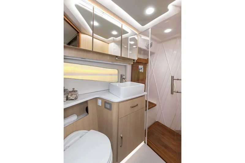 Slide: The Image of Manufacturer Provided Image: Luxurious bathroom interior of 2026 Regal 42 FXO yacht with modern fixtures and elegant design. - 11