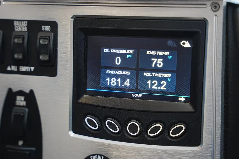 Slide: The Image of Dashboard display of a 2019 MasterCraft NXT22 boat showing engine metrics. - 10