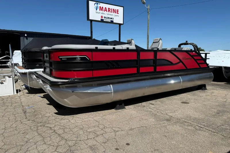 The Image of 2026 Bentley Pontoons Elite 223 Swingback in red, displayed at a marine dealership. - 1
