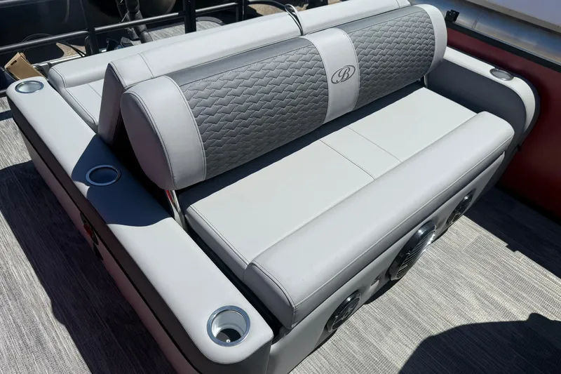 Slide: The Image of 2026 Bentley Pontoons Elite 223 Swingback seating with cup holders and stylish upholstery. - 10