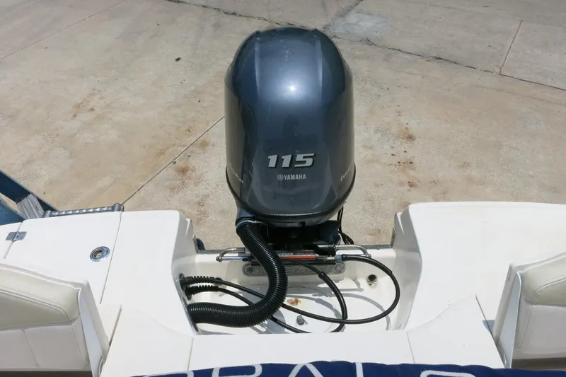 Slide: The Image of 2016 Robalo R180 Center Console with Yamaha 115 outboard motor, rear view. - 21
