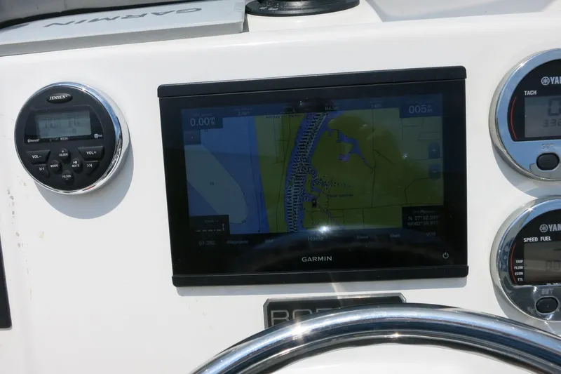 Slide: The Image of Dashboard of a 2016 Robalo R180 Center Console with Garmin navigation display. - 26