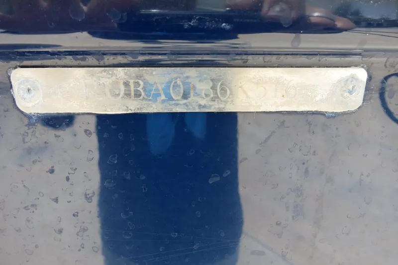 Slide: The Image of 2016 Robalo R180 Center Console boat identification plate. - 27