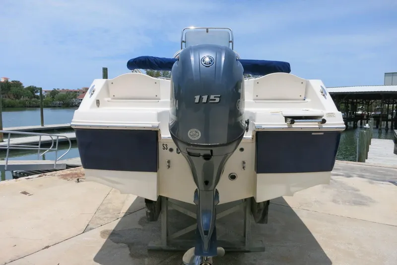 Slide: The Image of 2016 Robalo R180 Center Console boat with Yamaha 115 engine at dockside. - 8