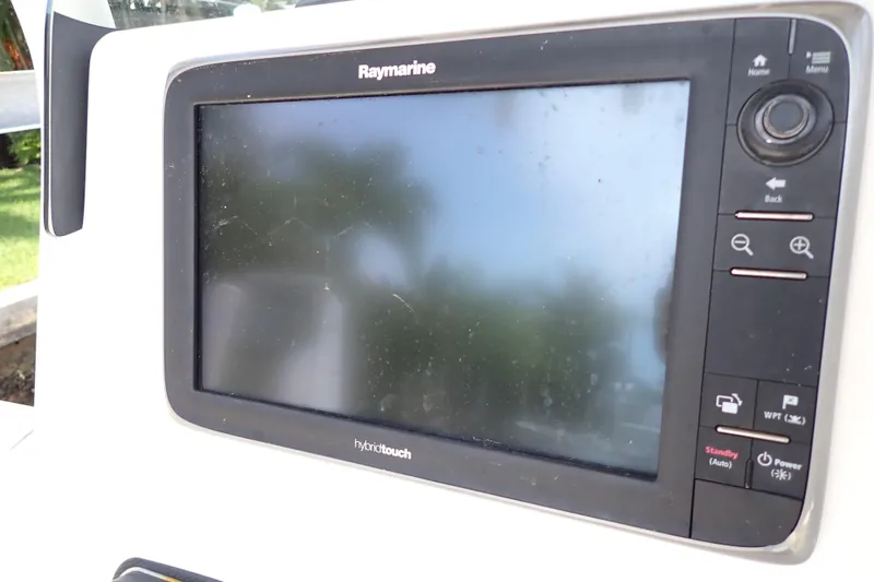 Slide: The Image of Raymarine display on 2015 Century 2301 Center Console boat, featuring HybridTouch technology. - 18