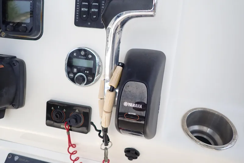 Slide: The Image of Control panel of a 2015 Century 2301 Center Console boat with Yamaha throttle. - 22