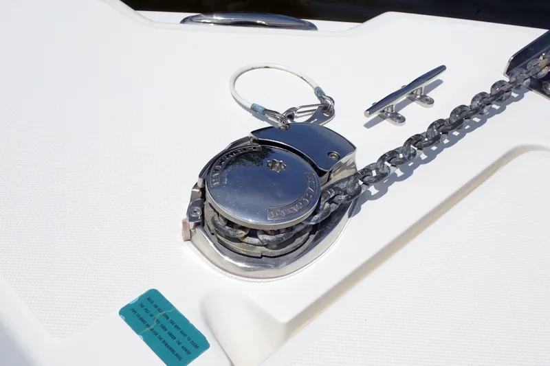 Slide: The Image of Anchor windlass on 2015 Century 2301 Center Console boat deck. - 48