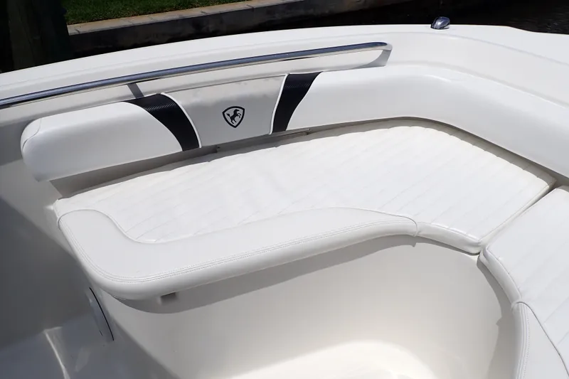 Slide: The Image of White seating area on a 2015 Century 2301 Center Console boat. - 55