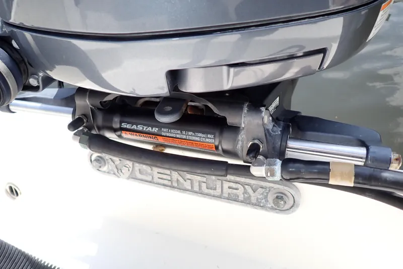 Slide: The Image of Close-up of a 2015 Century 2301 Center Console boat's SeaStar steering system. - 62