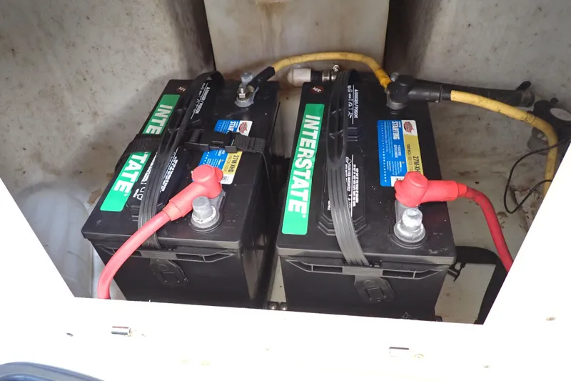 Slide: The Image of Two Interstate batteries installed in a 2015 Century 2301 Center Console boat. - 69
